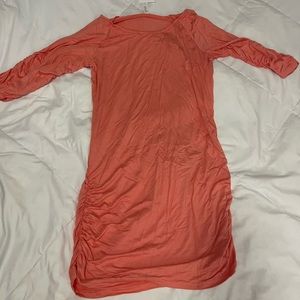Peach colored tunic with gathered sides